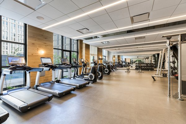 fitness center at The Girard Apartments