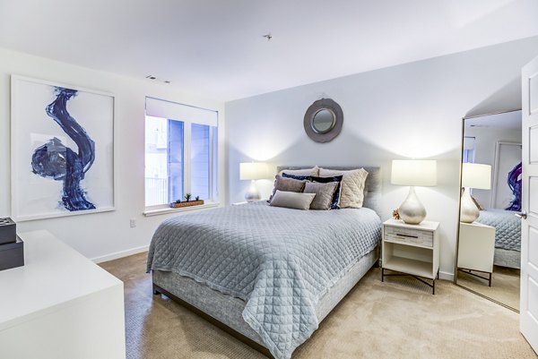 Bedroom featuring modern decor and coastal views in Ocean 650 Apartments