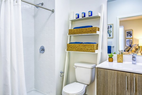 Spa-inspired bathroom featuring a soaking tub and sleek fixtures in Ocean 650 Apartments