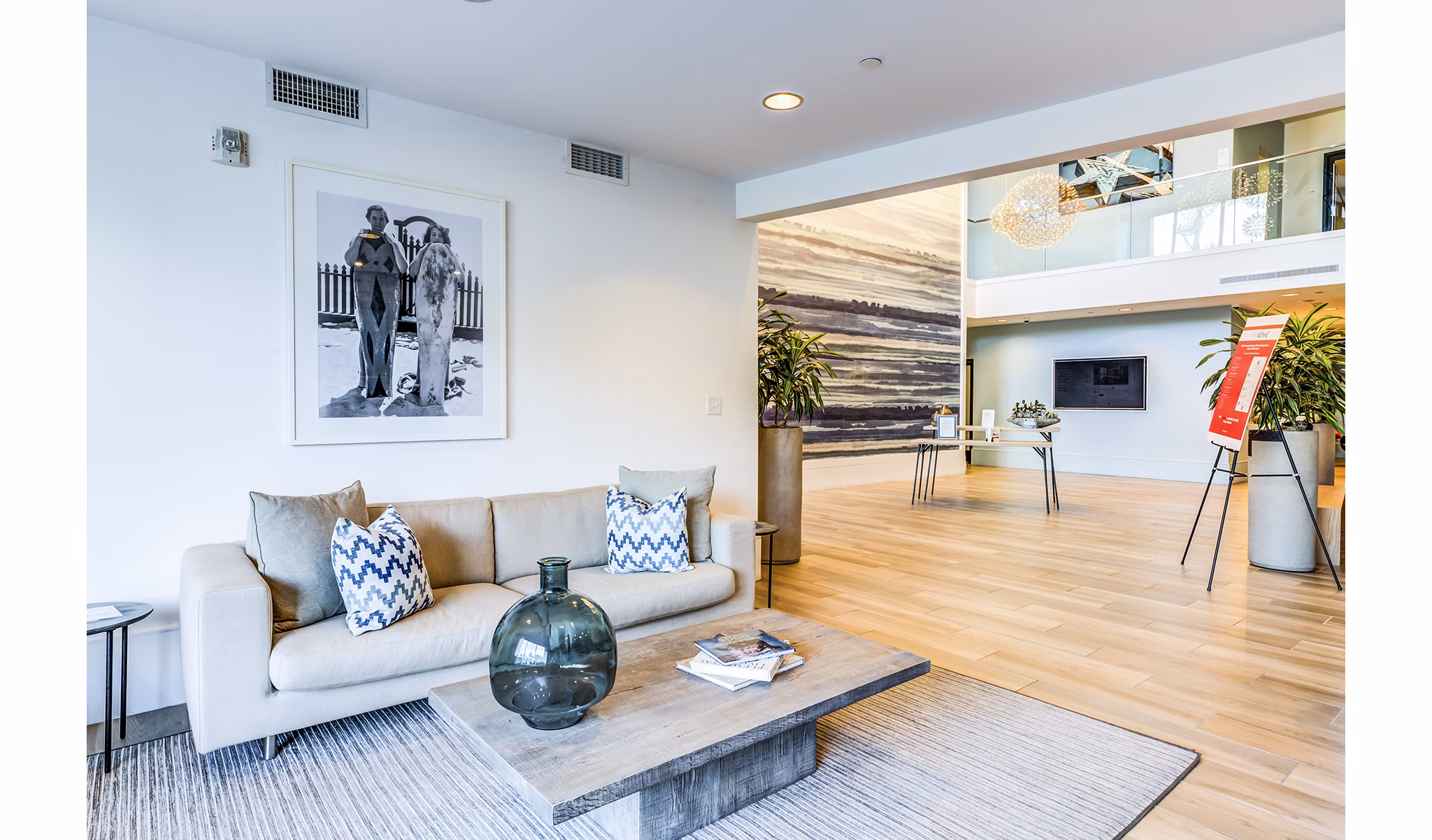 Clubhouse lobby with modern decor and comfortable seating at Ocean 650 Apartments, a luxury community offering stylish amenities and spaces