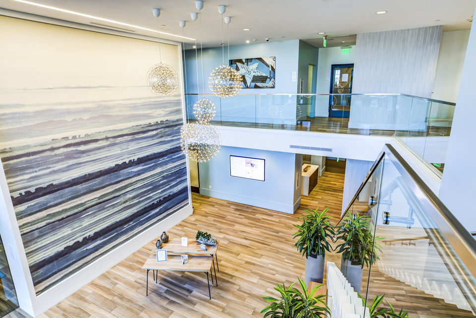 Clubhouse lobby featuring modern decor and seating at Ocean 650 Apartments