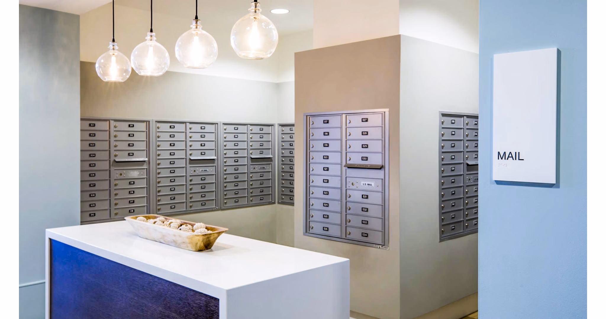 Mail room with secure parcel lockers at Ocean 650 Apartments
