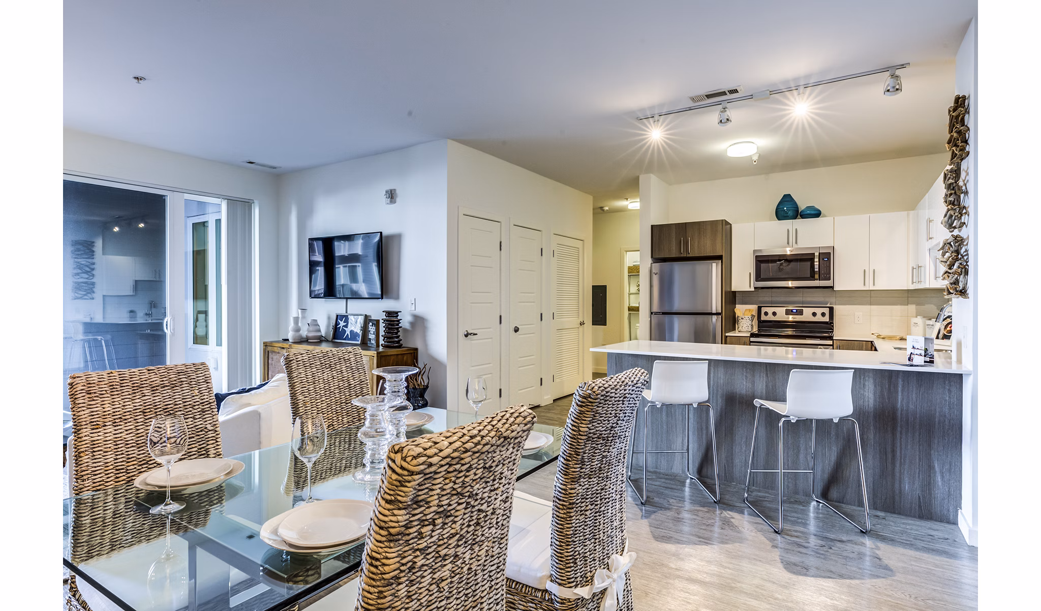 Dining room with modern decor and ocean views at Ocean 650 Apartments