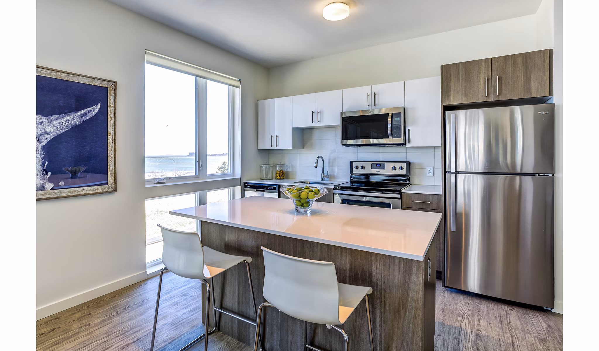 Sleek kitchen with stainless steel appliances at Ocean 650 Apartments, offering luxury living near the ocean
