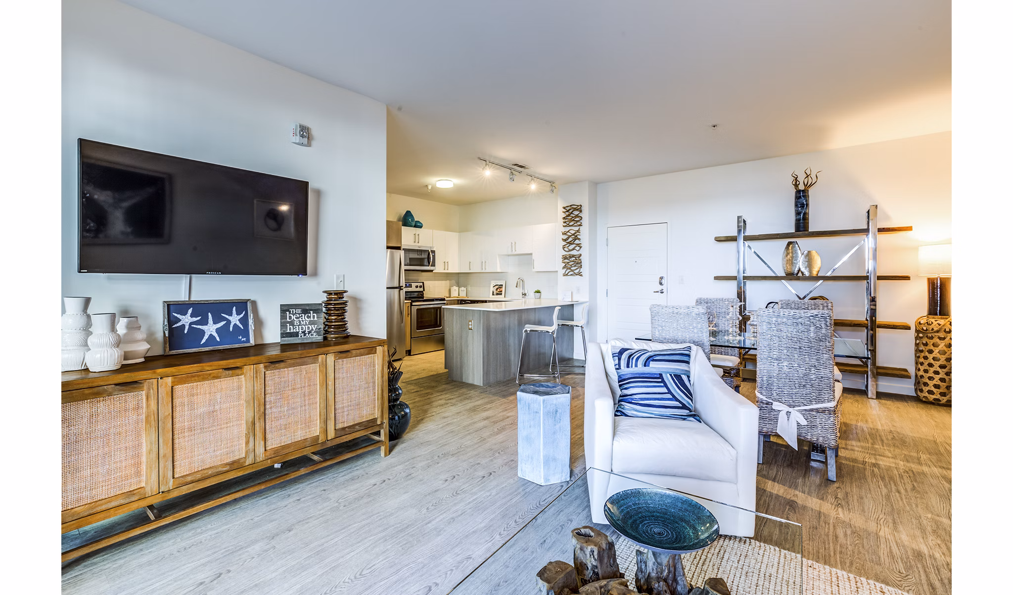 Living room featuring modern furnishings and ocean views at Ocean 650 Apartments