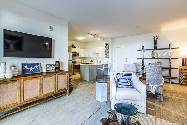 Living room featuring modern furnishings and ocean views at Ocean 650 Apartments
