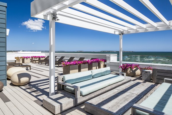 Outdoor patio with ocean views at Ocean 650 Apartments