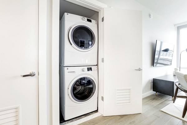 laundry room at Harbor 1500 Apartments