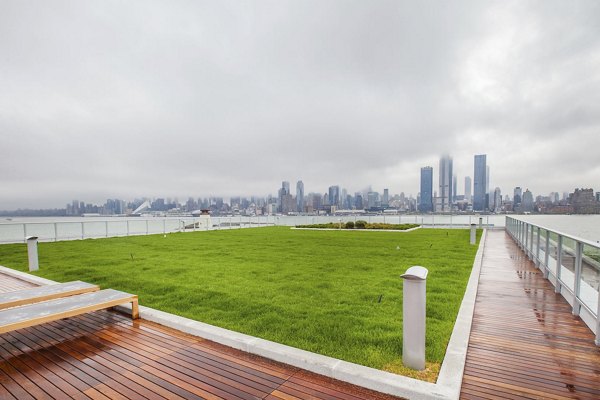 Rooftop garden with stunning skyline view at Harbor 1500 Apartments