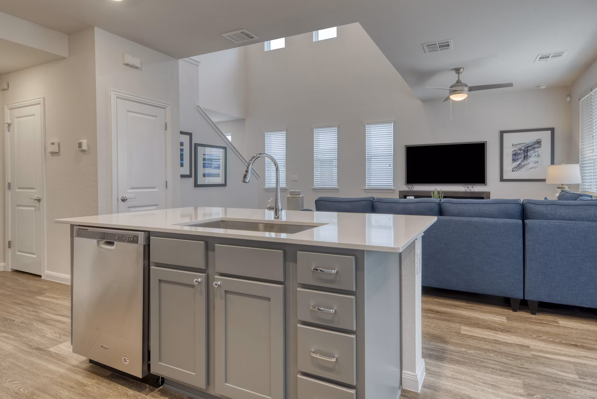 Modern kitchen with stainless steel appliances at Pradera Luxury Rental Homes