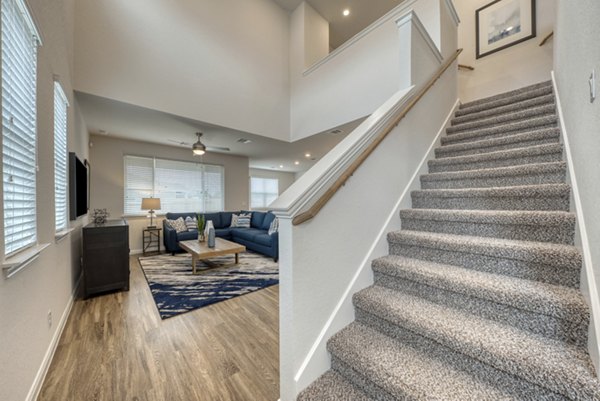 Spacious living room with contemporary dÃ©cor in Pradera Luxury Rental Homes