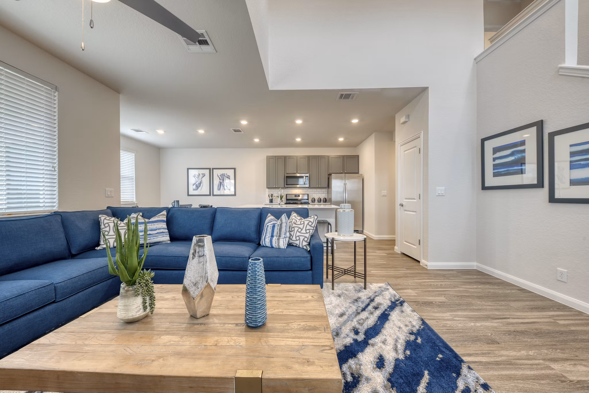 Elegant living room with modern decor and plush seating in Pradera Luxury Rental Homes
