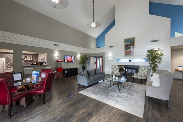 Clubhouse with modern furnishings at Raintree Apartments