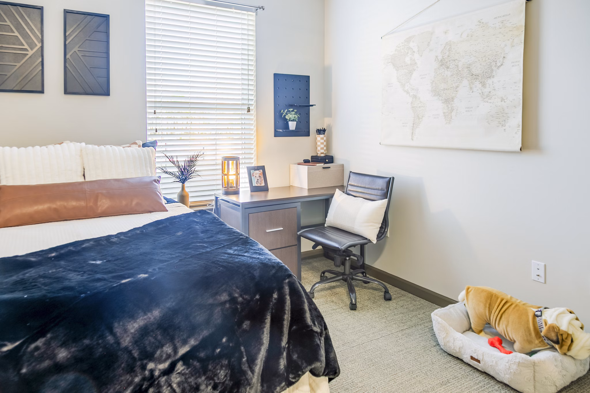 Cozy bedroom with modern decor at College View Apartments