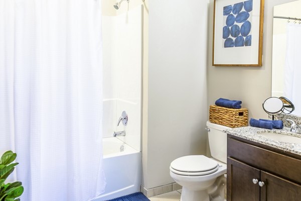 Modern bathroom with sleek fixtures at College View Apartments showcasing luxurious living experiences