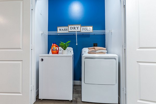 laundry room at The District on 5th Apartments