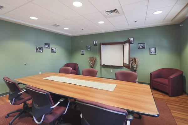 Evergreen Commons Apartments: Modern meeting facility with state-of-the-art equipment for productive gatherings