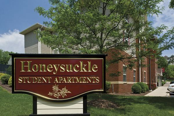 signage at Honeysuckle Student Apartments