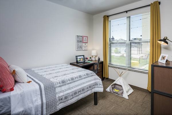 bedroom at The Local Downtown Apartments