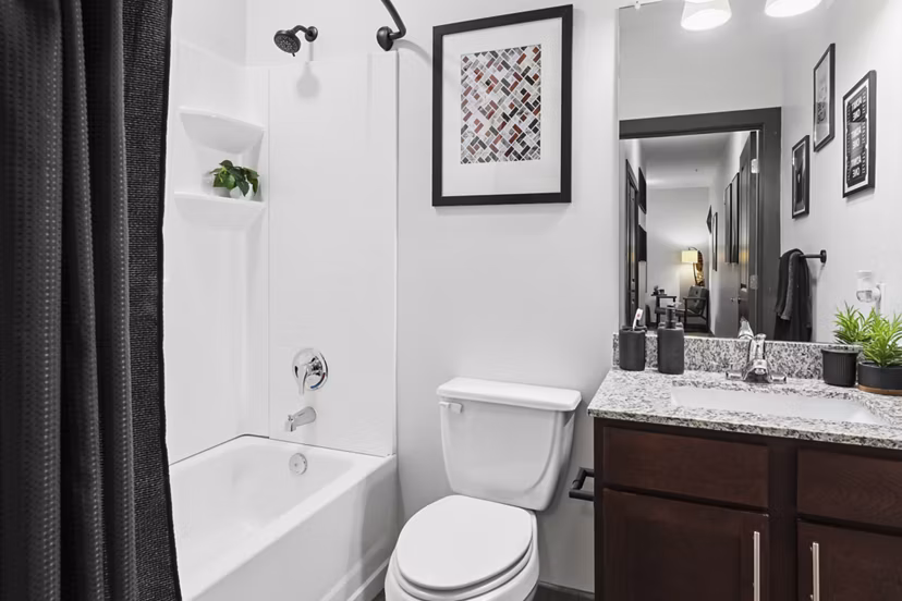Modern bathroom with sleek fixtures at The Local Downtown Apartments, offering luxury living in a prime location