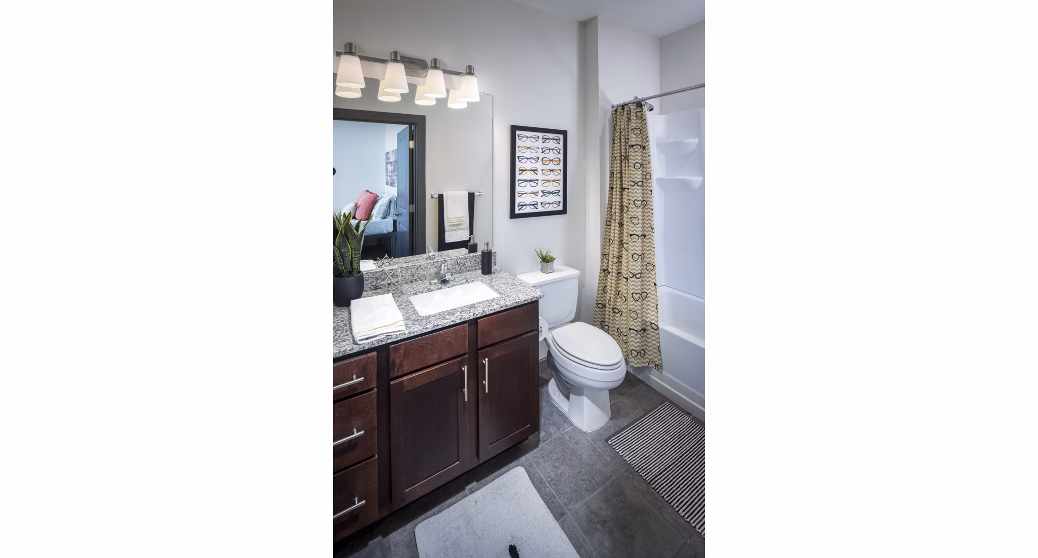 Luxury bathroom with sleek fixtures at The Local Downtown Apartments offering modern amenities and stylish design