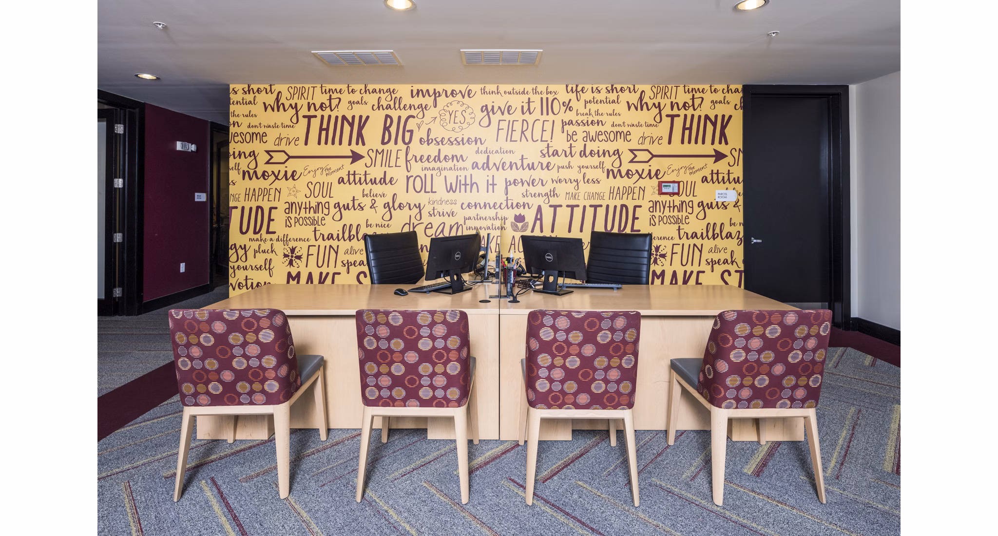 Clubhouse leasing office with modern design at The Local Downtown Apartments in an urban setting