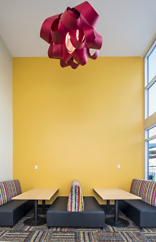 Clubhouse lobby featuring modern decor and seating at The Local Downtown Apartments