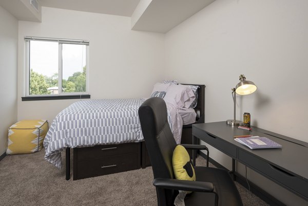 Cozy bedroom with modern decor at Lokal Apartments