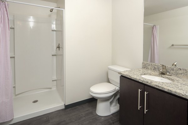 Modern bathroom with sleek fixtures at Lokal Apartments
