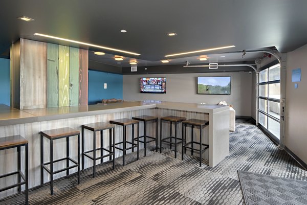 Stylish clubhouse featuring modern furnishings at Lokal Apartments