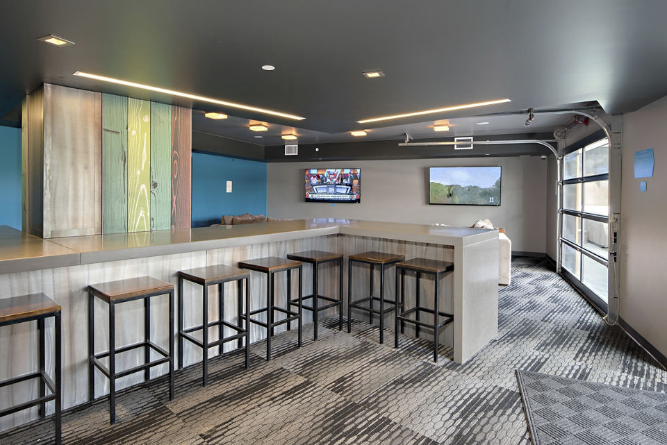 Stylish clubhouse featuring modern furnishings at Lokal Apartments