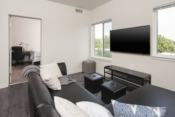 Spacious living room with modern decor in Lokal Apartments