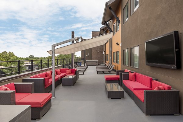 Scenic city vistas from rooftop deck at Lokal Apartments