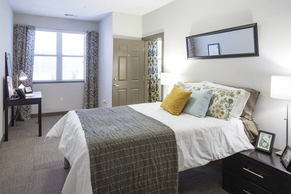 bedroom at The Lotus Apartments