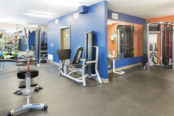 fitness center at The Lotus Apartments