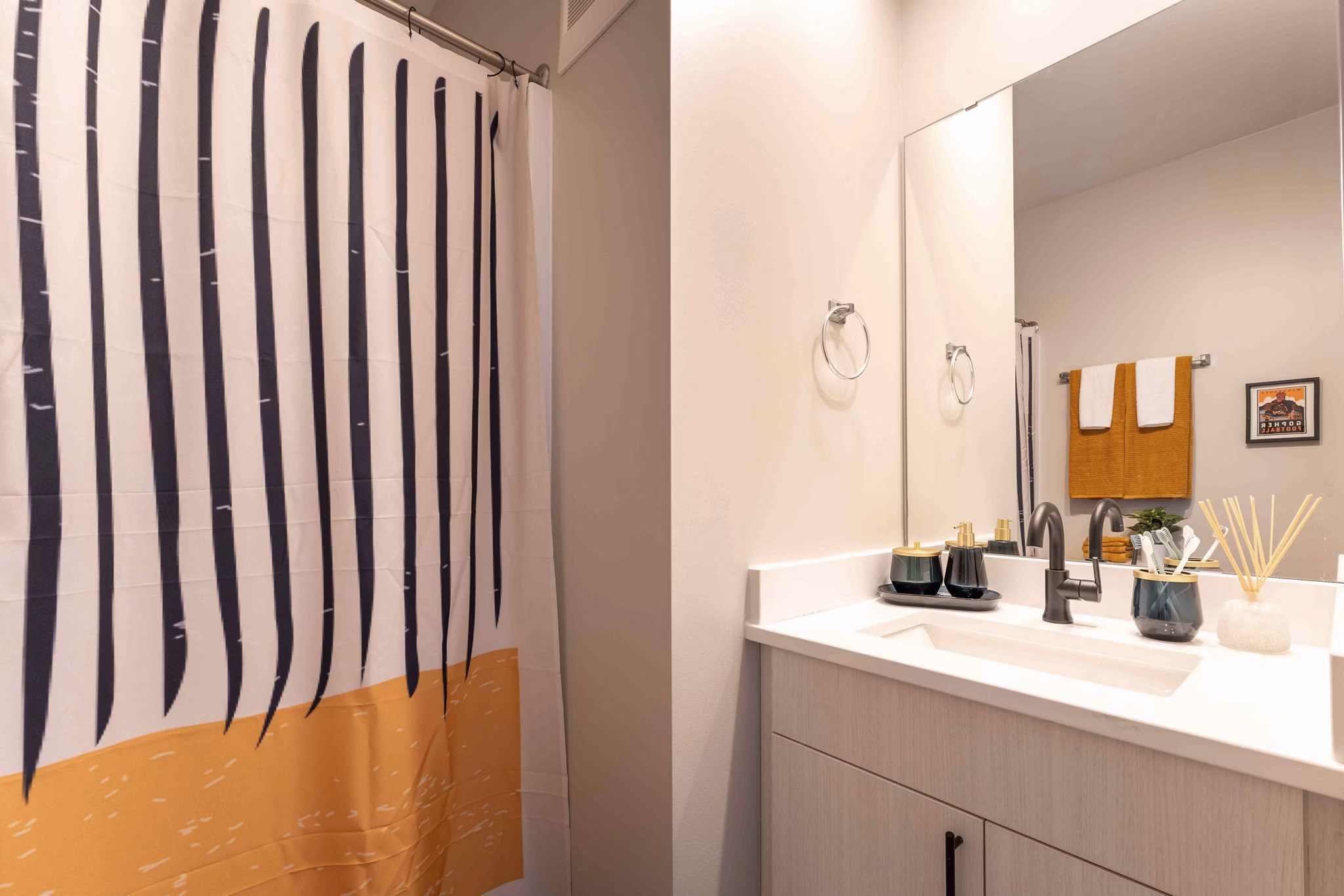 Modern bathroom with sleek fixtures and elegant design at The Marshall Apartments
