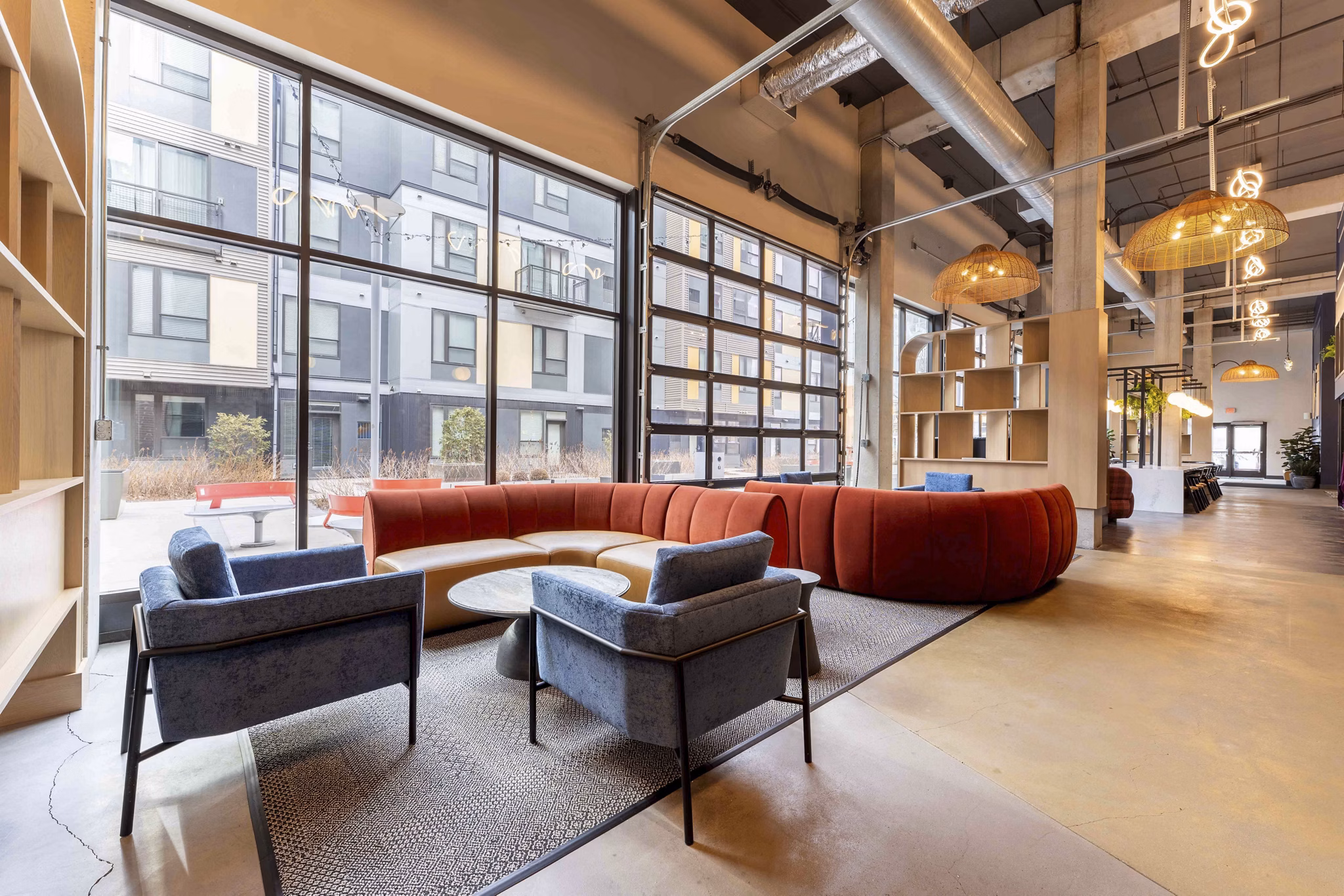 Clubhouse featuring modern seating and entertainment options at The Marshall Apartments