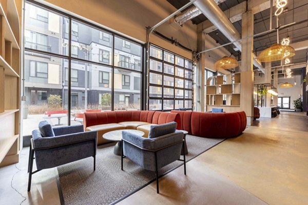 Clubhouse featuring modern seating and entertainment options at The Marshall Apartments