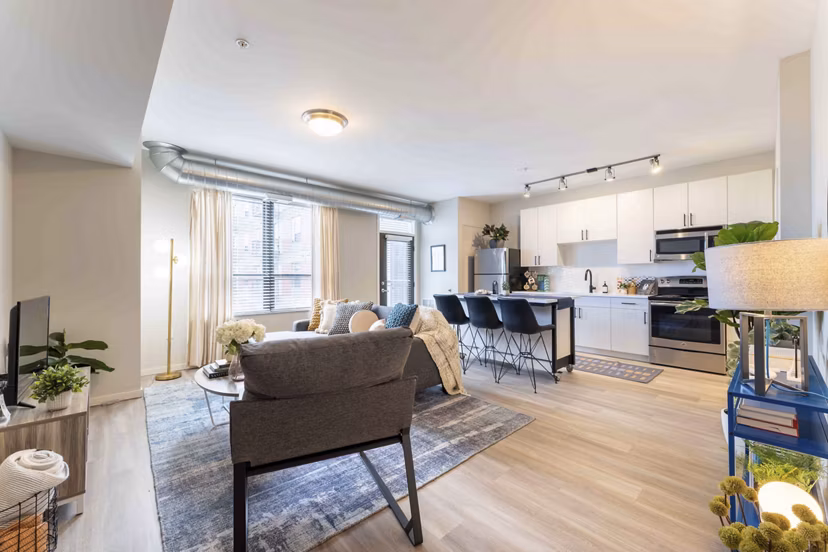 Cozy dining area with modern lighting at The Marshall Apartments