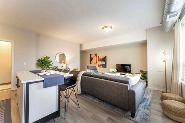 Cozy bedroom with modern furnishings in The Marshall Apartments