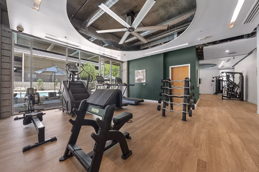 Fitness center at Roosevelt Point Apartments