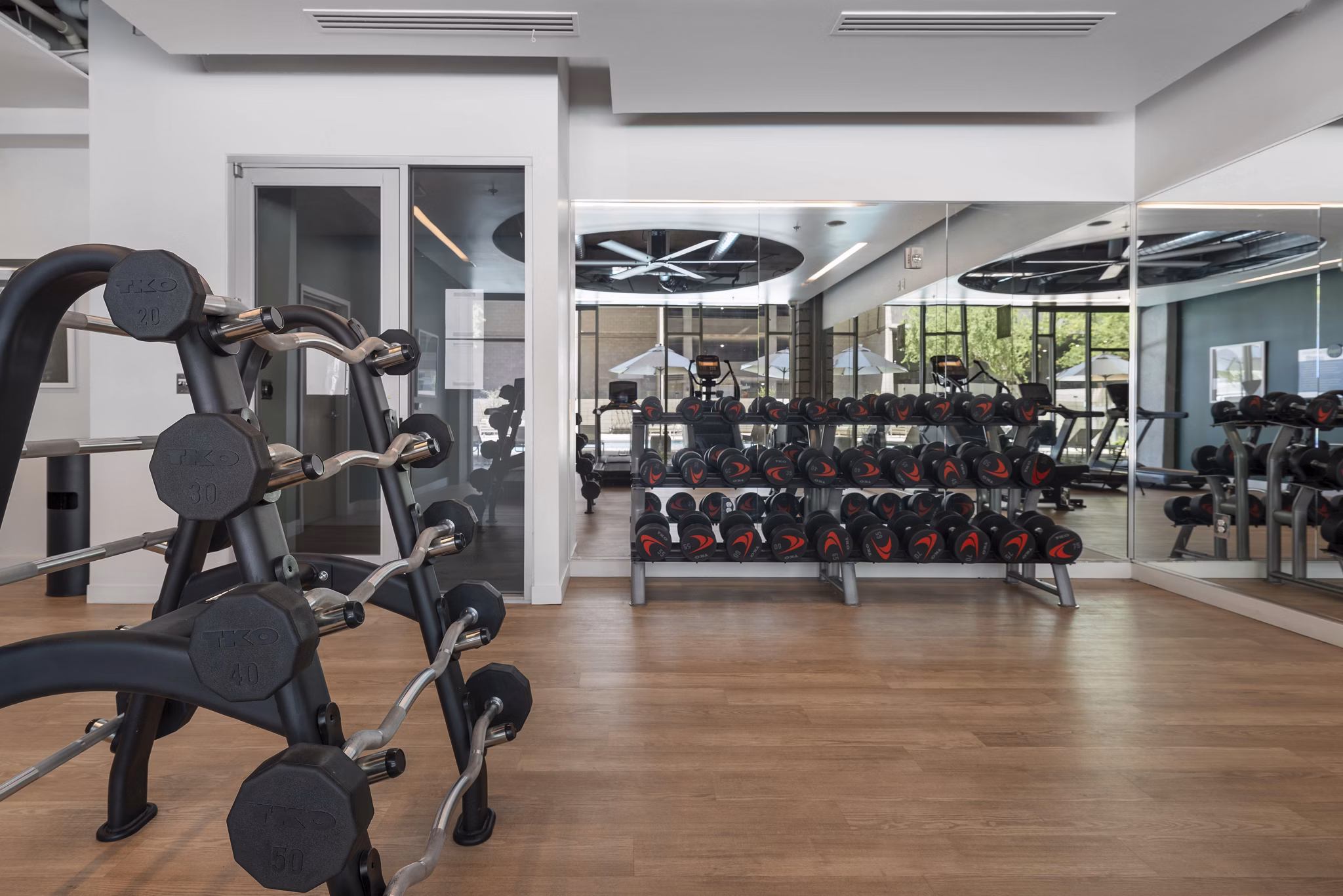 Fitness center at Roosevelt Point Apartments
