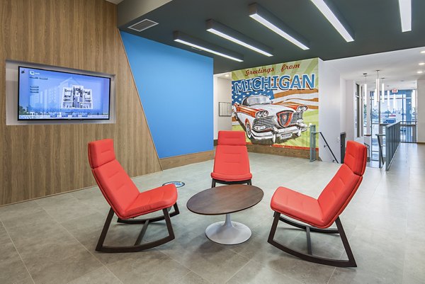 Modern clubhouse and lobby area with stylish seating at SkyVue Apartments, showcasing luxury amenities and contemporary design features