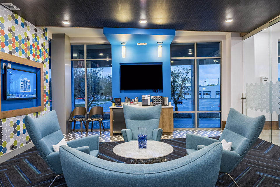 Clubhouse lobby with modern design elements at SkyVue Apartments