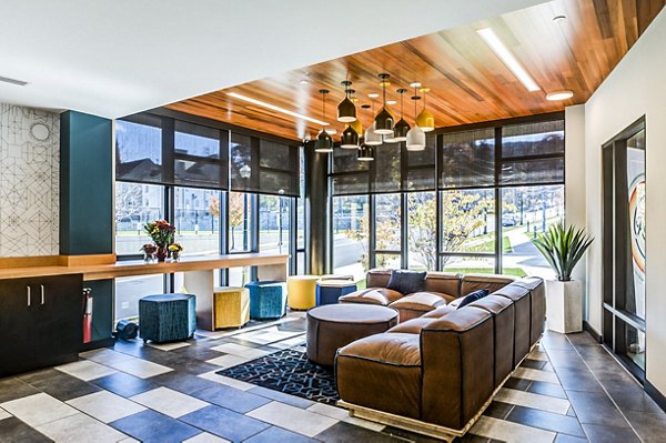 Clubhouse featuring modern lounge and recreational spaces in Southside Commons Apartments Perfect for social gatherings and relaxation in a luxury setting