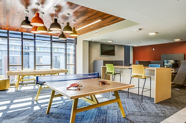 Clubhouse featuring a modern game room at Southside Commons Apartments