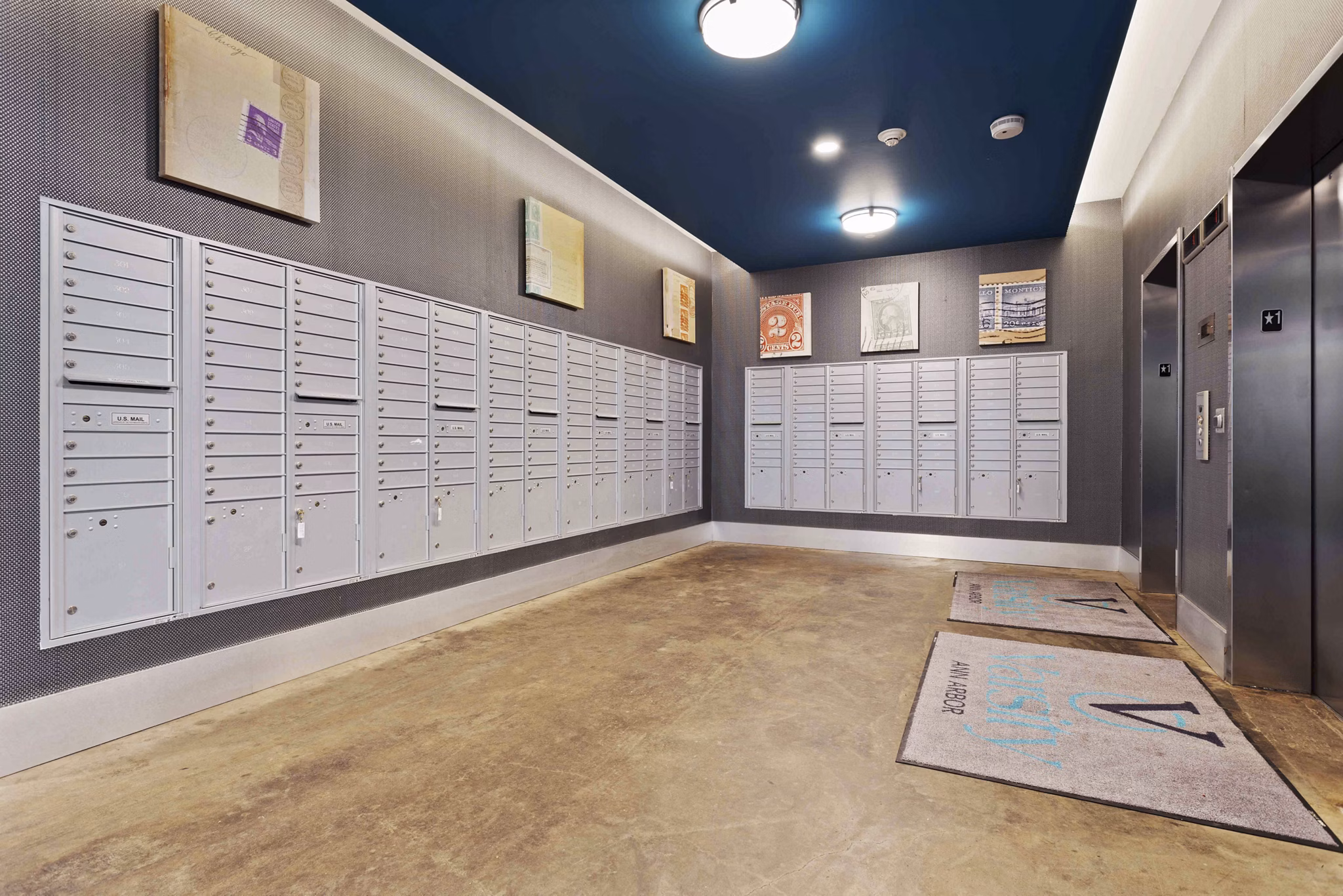 Mailroom with secure package lockers at The Varsity Apartments