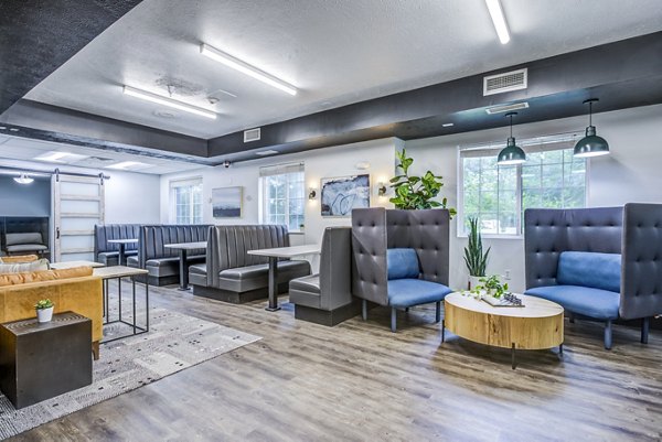 Clubhouse study area with modern design at Campus Village - E Lansing Apartments for students