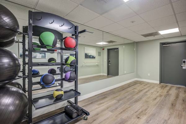 fitness center at University Village Towers Apartments