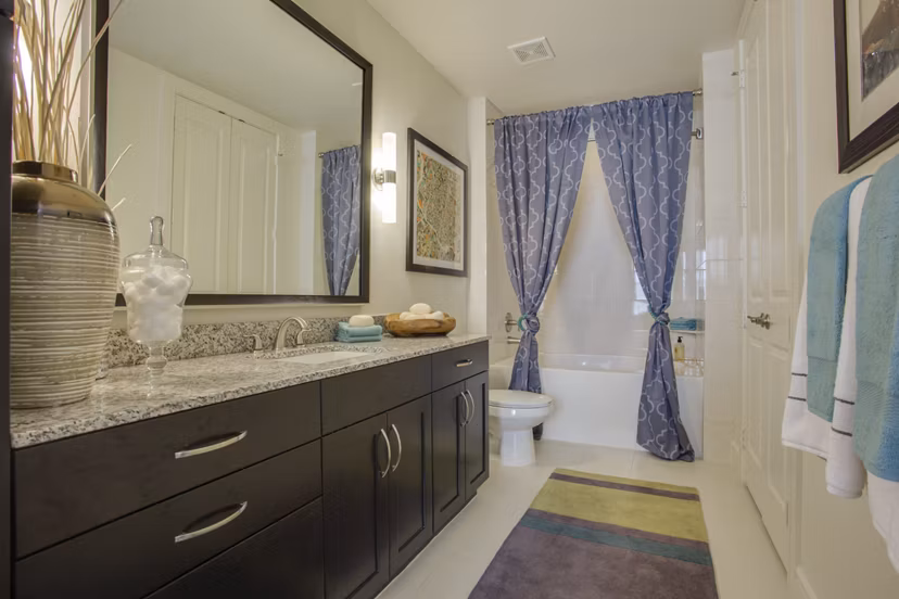 Luxurious bathroom featuring modern fixtures in The Michael at Presidio Apartments